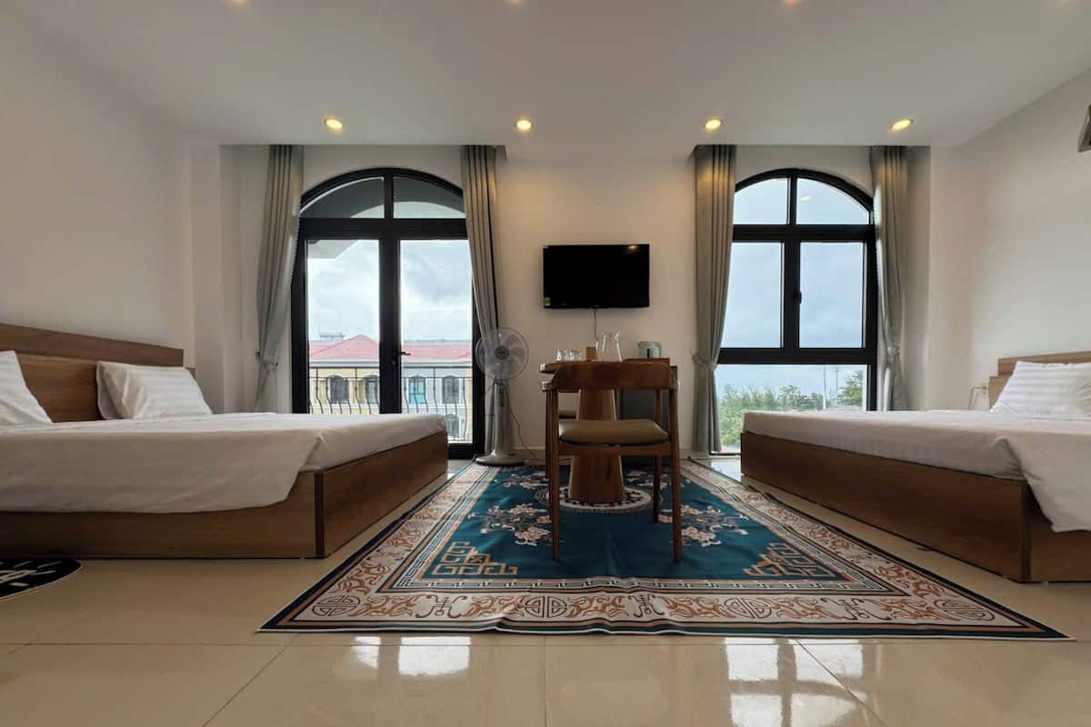 Standard Quadruple Room, Balcony, Garden View | Desk, free WiFi, bed sheets