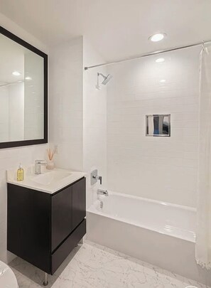 Hair dryer, towels, soap, toilet paper