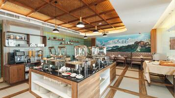 Daily buffet breakfast (USD 15 per person)