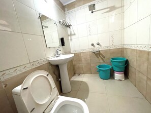 Double Room | Bathroom | Shower, free toiletries, towels, soap