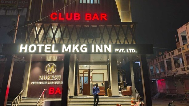 A Club Bar and Hotel MKG Inn with a modern facade and a staircase leading to the entrance. - Hotel MKG Inn Club and Bar Jaipur (Jaipur)