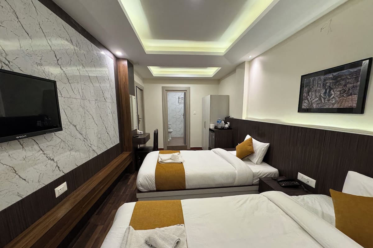 Chambre Supérieure avec lits jumeaux | Espace de travail pour ordinateur portable, Wi-Fi gratuit, draps fournis