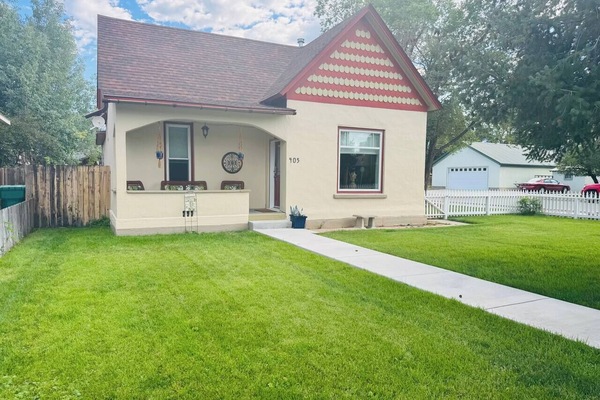 Enjoy the front patio with the full fenced in yard! Perfect to soak in the sun!