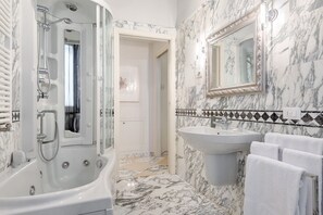 Hair dryer, towels, soap, shampoo
