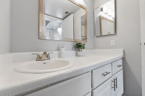 Hair dryer, towels, soap, toilet paper