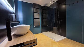 Shower, hair dryer, bathrobes, towels