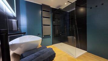 Superior Suite, 2 Bedrooms, Roll-in Shower, Microwave | Bathroom | Shower, hydromassage showerhead, hair dryer, bathrobes