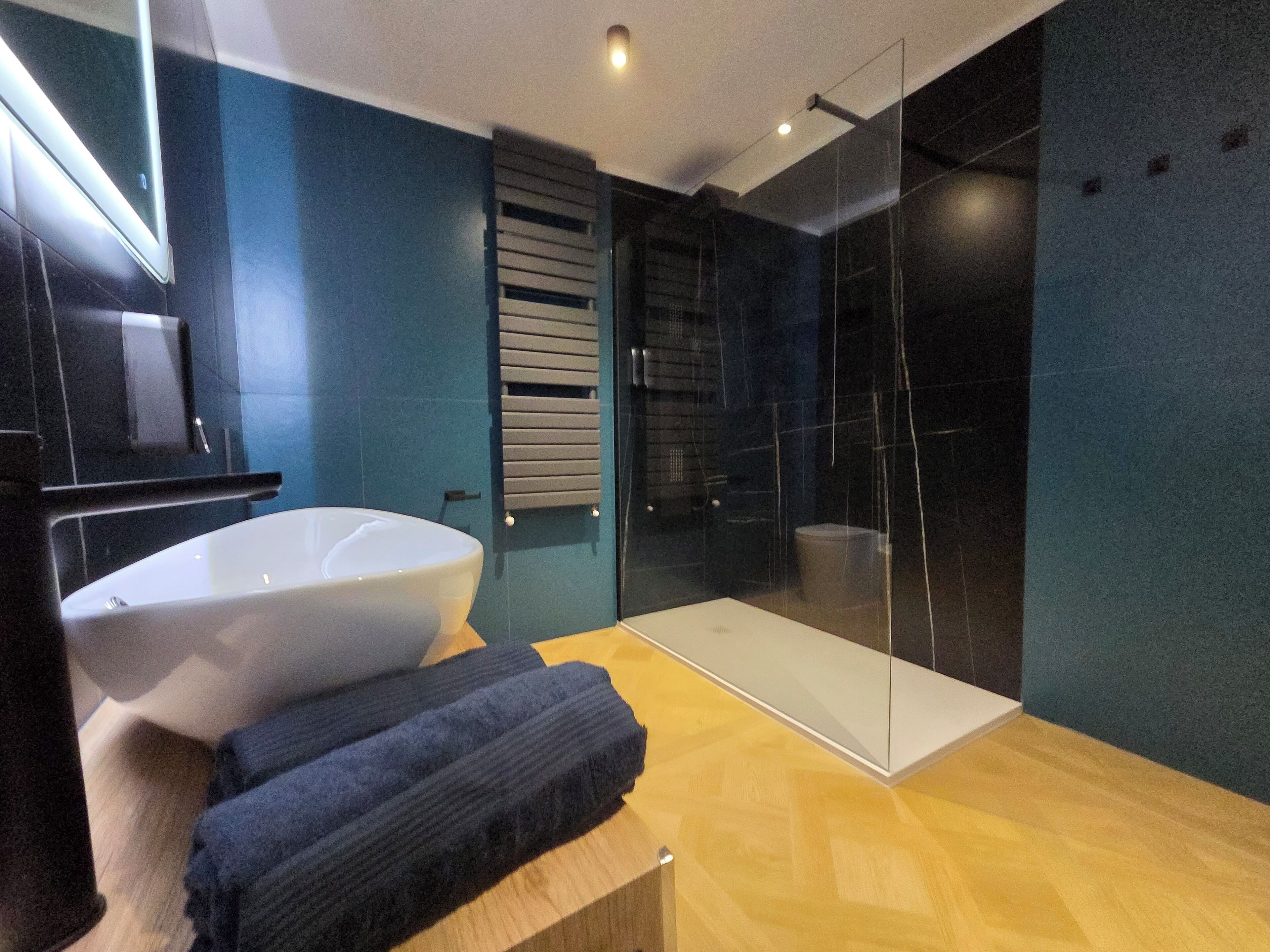 Superior Suite, 2 Bedrooms, Roll-in Shower, Microwave | Bathroom | Shower, hair dryer, bathrobes, towels
