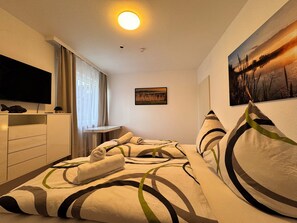 3 slaapkamers, een bureau, een strijkplank/strijkijzer, gratis wifi