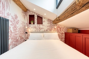 1 غرفة نوم ومكواة/لوح كي وخدمة الإنترنت وملاءات أسرّة