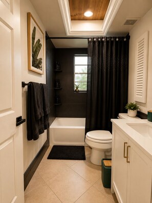 Shower, hair dryer, bidet, towels