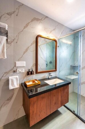 Shower, hair dryer, slippers, towels