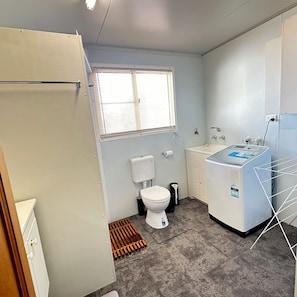 Shower, towels, soap, toilet paper