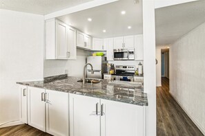 Microwave, dishwasher, coffee/tea maker, toaster