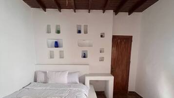 2 quartos, ferros/tábuas de passar roupa, acesso à internet