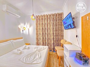Chambre double, balcon, vue sur la ville | Commodité de la chambre