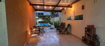 Family house - Suites with air conditioning, swimming pool and barbecue, 250m from Sapê beach.