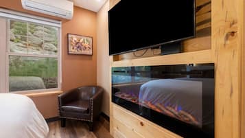 1 bedroom, desk, iron/ironing board, travel crib