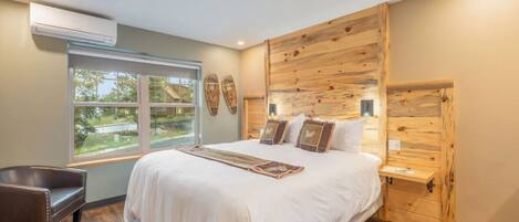 1 bedroom, desk, iron/ironing board, travel crib