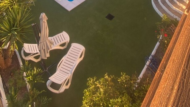 Pool - This is a double room with a double bed. It has an en-suite bathroom. The window in the room looks out into the hallway. (Vilaflor)