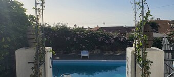 This twin room has two single beds with a private separate bathroom ( bathroom across the hallway). The view is of the whole garden area and the sea can be seen on clear days.