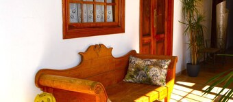 This room is a bunk room with two single bunk beds. The bathroom and showers are shared with the two other bunk rooms . The room has a great view of the village square.