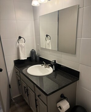 Hair dryer, towels, toilet paper