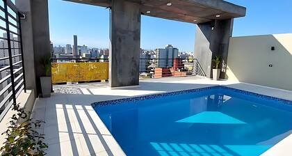 Moderna Suite GPT with a swimming pool and parking