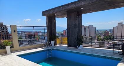 Moderna Suite GPT with a swimming pool and parking