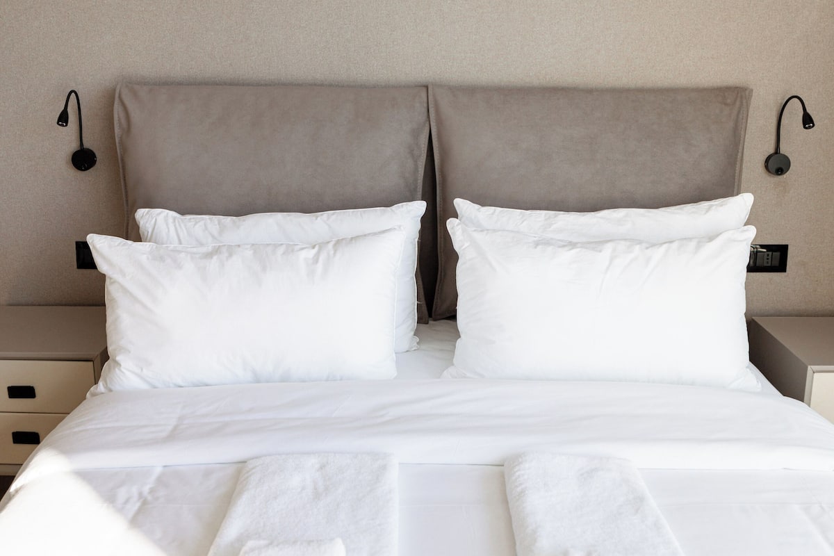 Egyptian cotton sheets, premium bedding, down comforters, minibar