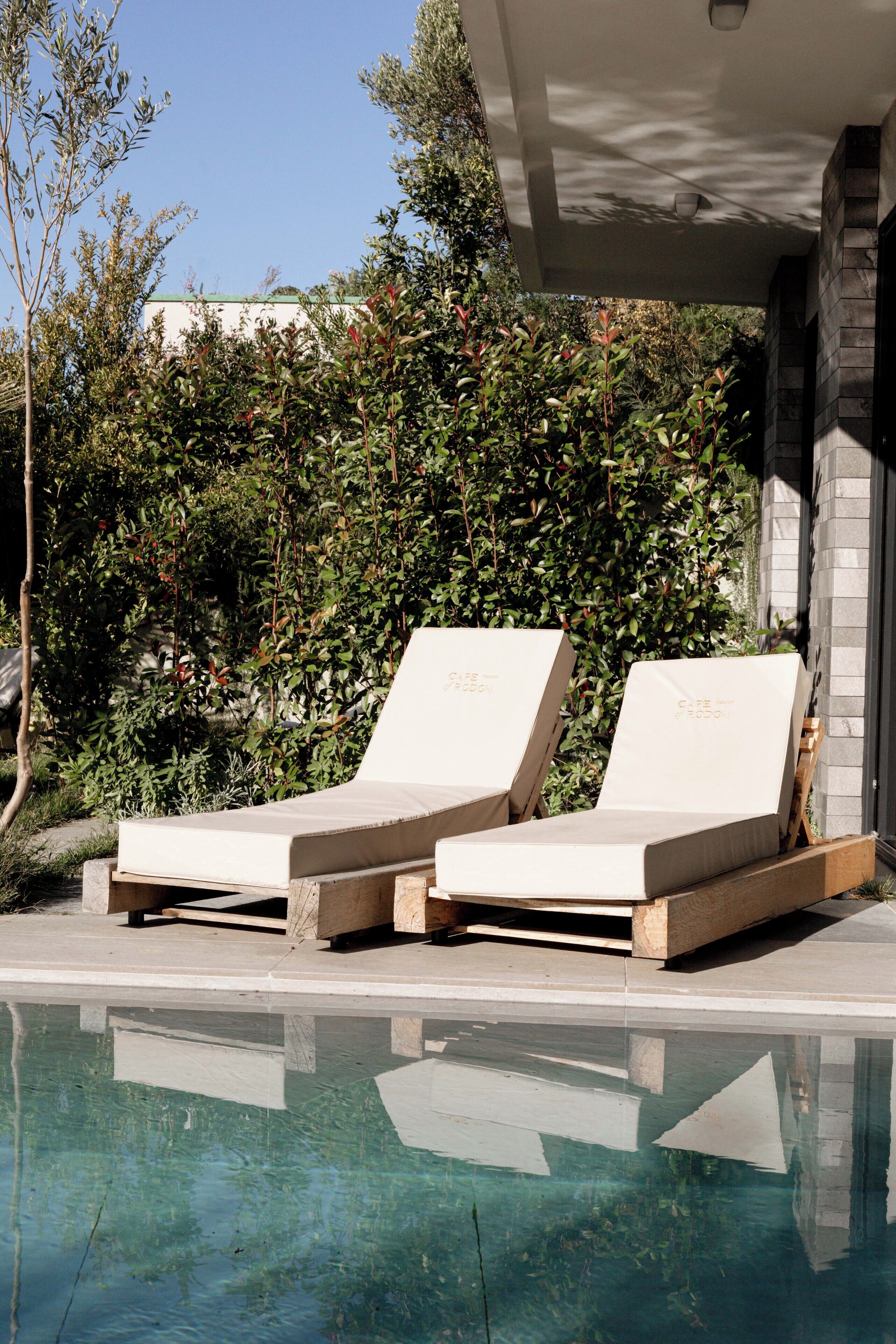 Suite de luxe, vistes al mar, al costat de la piscina | Llençols de cotó egipci, roba de llit d'alta qualitat i cobrellits 