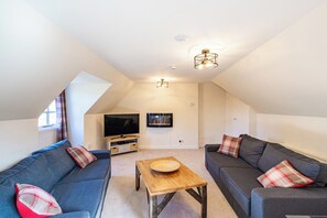 Smart TV, fireplace, DVD player, books