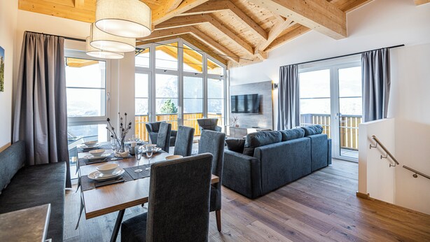 Deluxe Penthouse, 3 Bedrooms | Living area | 50-inch Smart TV with cable channels, heated floors - AlpenParks Hotel & Apartment Alpendorf (Sankt Johann im Pongau)