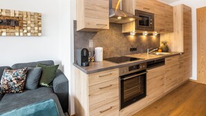 Classic Apartment, 2 Bedrooms, Ground Floor | Private kitchen | Coffee/tea maker, full-sized fridge, microwave, toaster - AlpenParks Hotel & Apartment Alpendorf (Sankt Johann im Pongau)