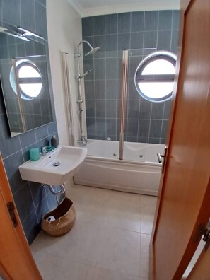 Shower, jetted tub, hair dryer, bidet