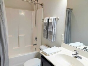 Hair dryer, towels, soap, shampoo