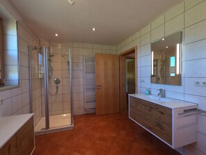 Shower, hair dryer, towels, soap