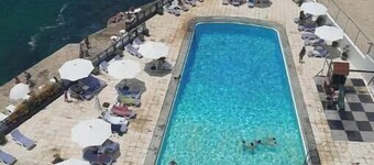 Big Seaview studio, 24h electricity, beach + pool