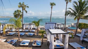 On the beach, white sand, free beach shuttle, sun loungers