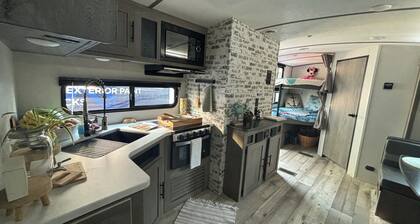 Cozy RV in Serene Dallas with AC
with a private room and 2 bunk beds plus one