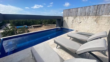 Departamento, 2 habitaciones, para fumadores | Alberca | Alberca al aire libre