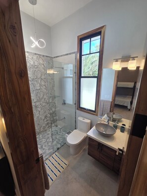 Shower, hair dryer, towels, soap