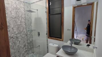 Shower, hair dryer, towels, soap