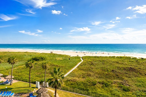 On the beach, sun loungers, beach towels