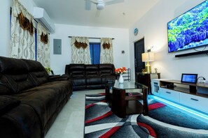 Living area - Elegant 3-bedroom Jamaican escape with AC and stunning ocean view in Runaway Bay (Runaway Bay)