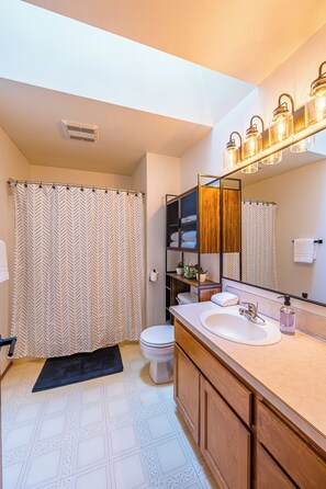 Hair dryer, towels, soap, shampoo