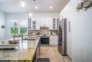 Oven, stovetop, coffee/tea maker, cookware/dishes/utensils