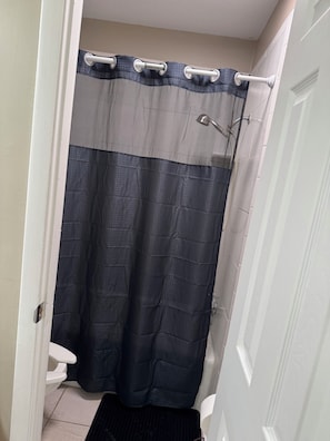 Hair dryer, towels, soap, toilet paper
