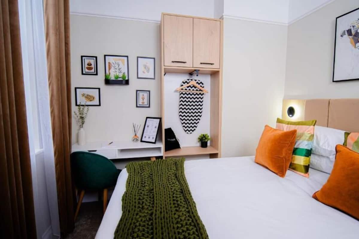 Standard Double Room | Desk, laptop workspace, blackout drapes, iron/ironing board