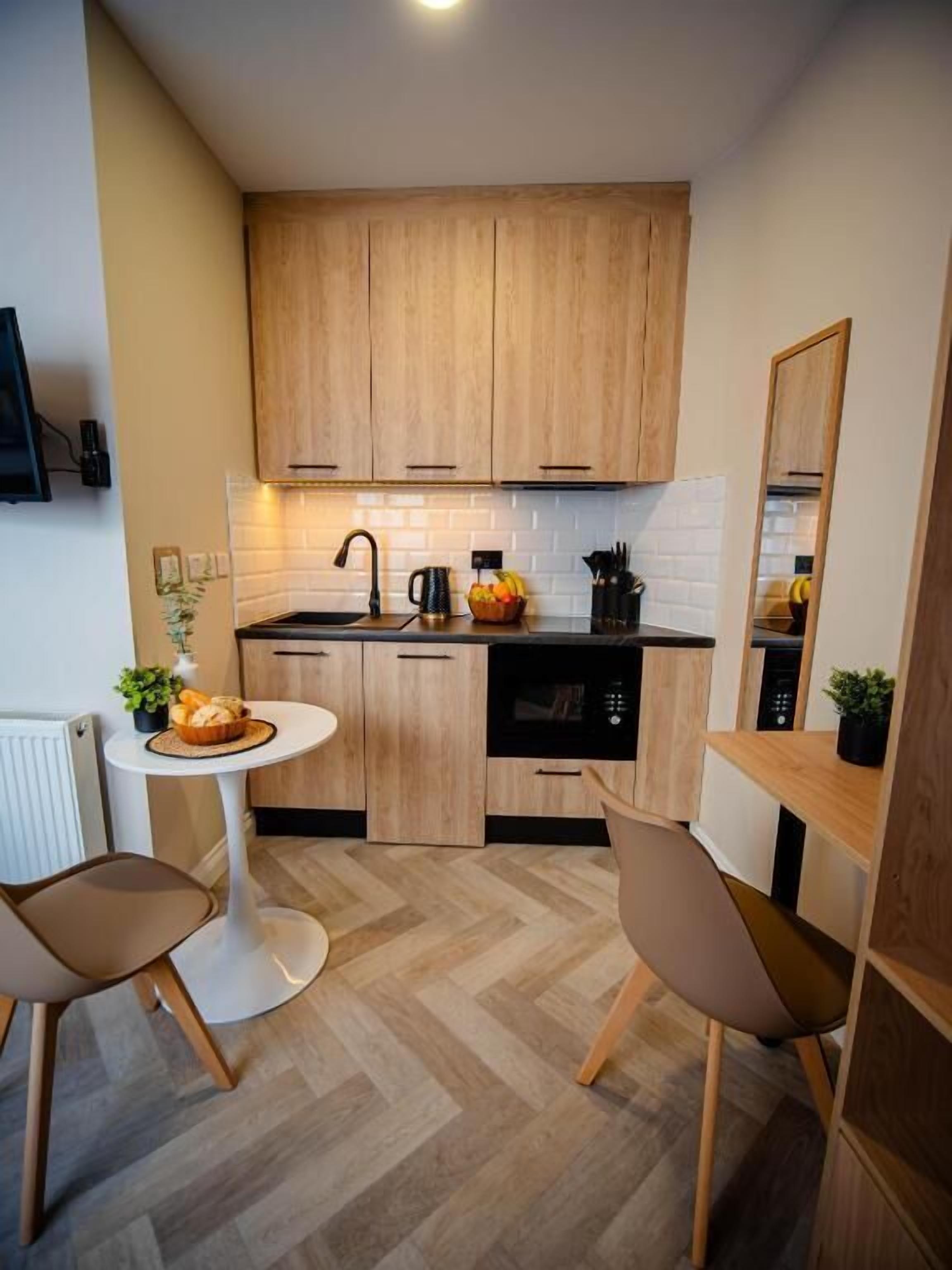 Standard Double Room | Private kitchen | Fridge, microwave